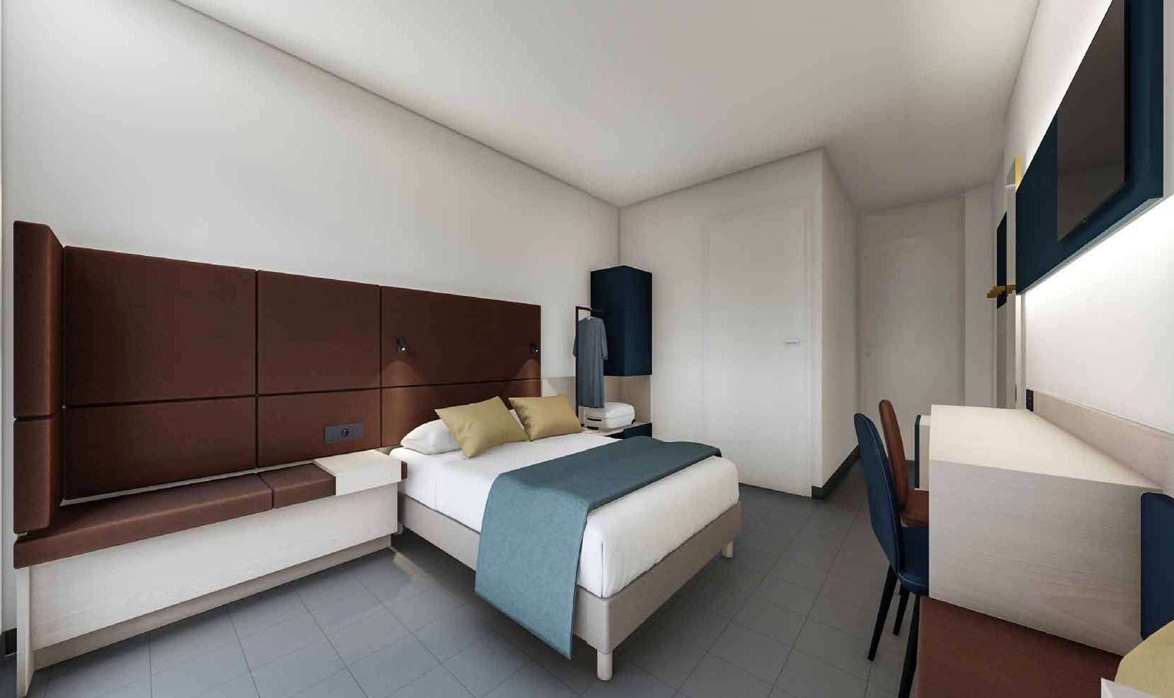 Chambre d’hôtel collection Prime — mobilier hôtelier sur mesure, style cuir & banquette